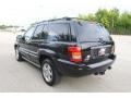 2004 Brillant Black Crystal Pearl Jeep Grand Cherokee Overland 4x4  photo #14