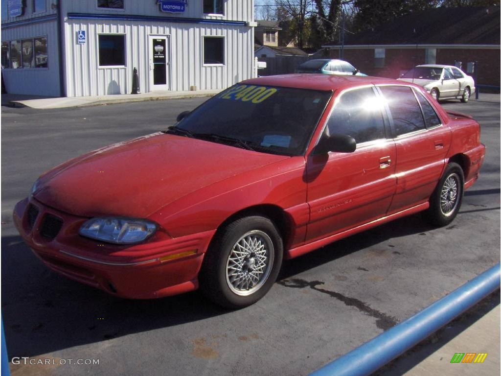 1997 Grand Am SE Sedan - Bright Red / Taupe photo #1