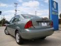 2004 Light Tundra Metallic Ford Focus SE Sedan  photo #30