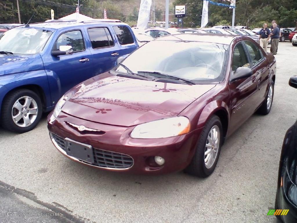 2001 Sebring LXi Sedan - Dark Garnet Red Pearlcoat / Taupe photo #2