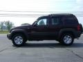 2004 Deep Molten Red Pearl Jeep Liberty Sport 4x4  photo #4