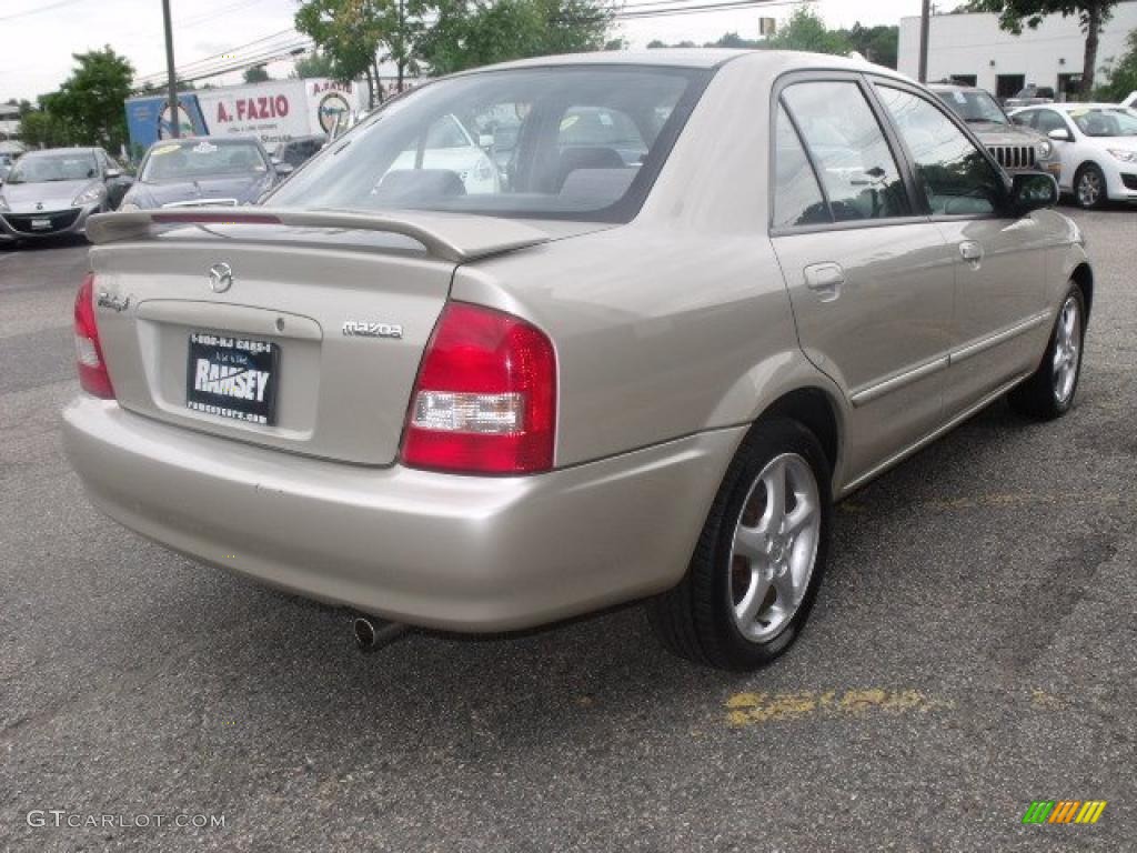 2002 Protege ES - Light Sandalwood Metallic / Off Black photo #3
