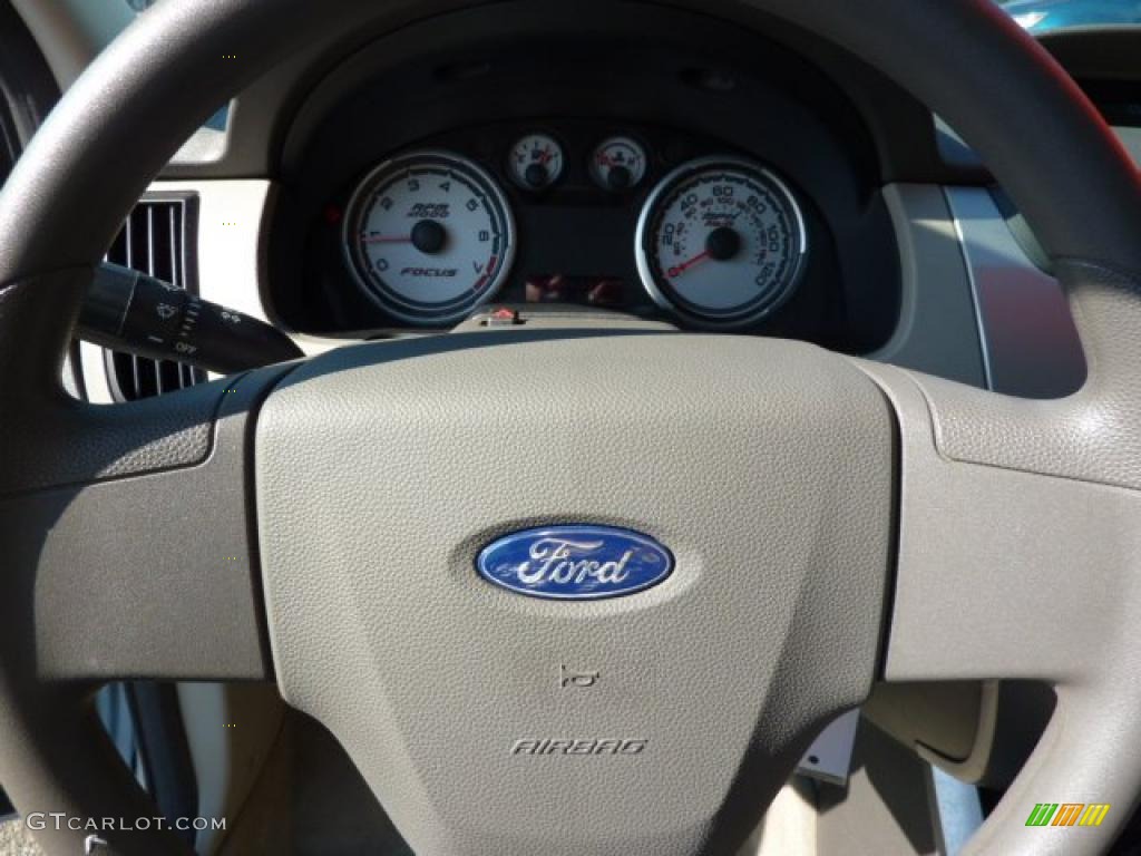 2009 Focus SE Sedan - Light Ice Blue Metallic / Medium Stone photo #19