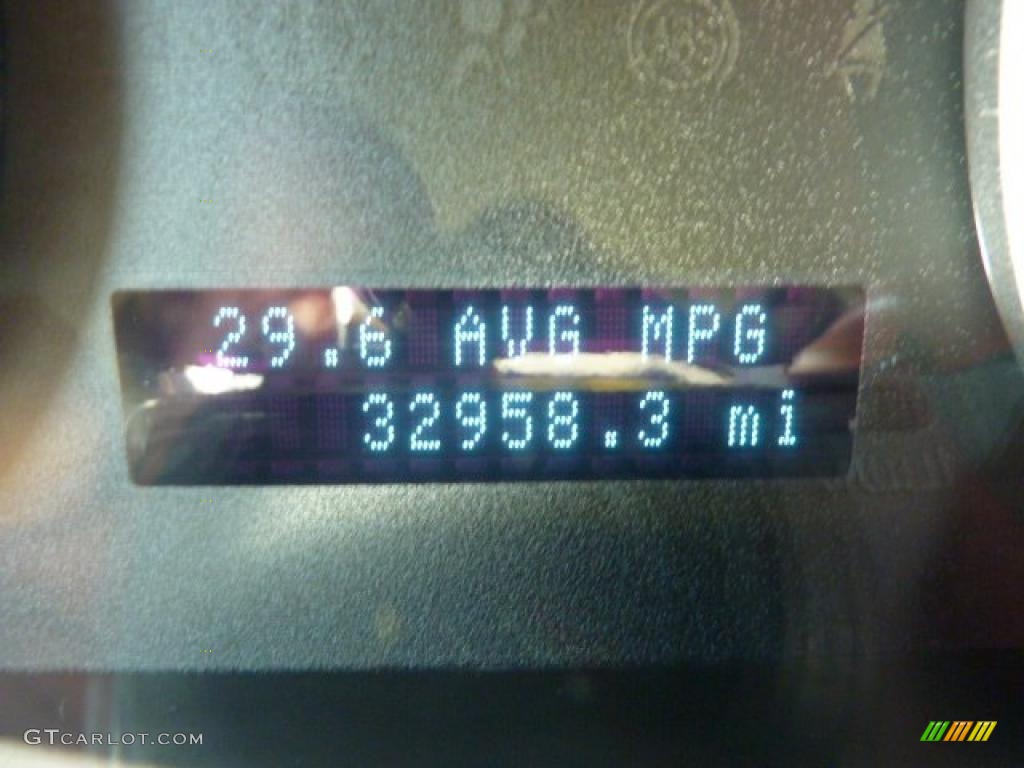 2009 Focus SE Sedan - Light Ice Blue Metallic / Medium Stone photo #20