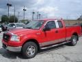 2005 Bright Red Ford F150 XLT SuperCab 4x4  photo #3