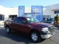 2006 Dark Toreador Red Metallic Ford F150 XLT SuperCab  photo #1