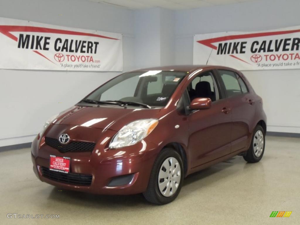 2009 Yaris 5 Door Liftback - Carmine Red Metallic / Dark Charcoal photo #1