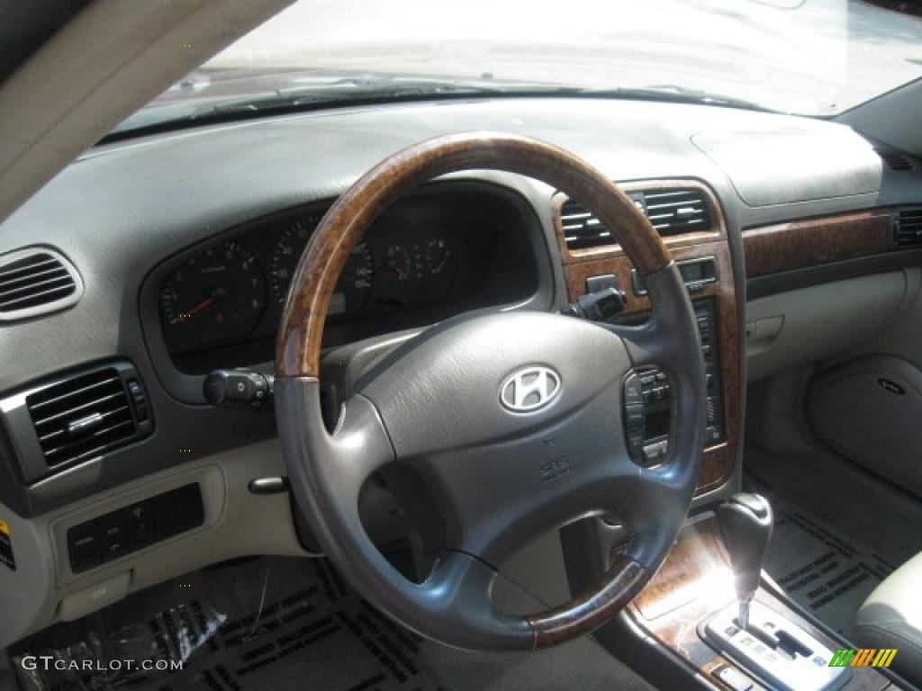 2004 XG350 L Sedan - Bordeaux Red Metallic / Beige photo #27