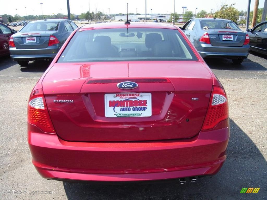 2011 Fusion SE - Red Candy Metallic / Charcoal Black photo #4