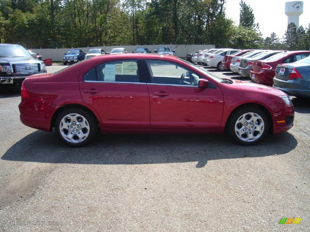 2011 Fusion SE - Red Candy Metallic / Charcoal Black photo #6