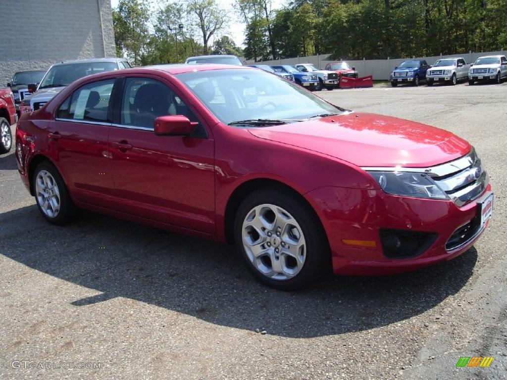 2011 Fusion SE - Red Candy Metallic / Charcoal Black photo #7