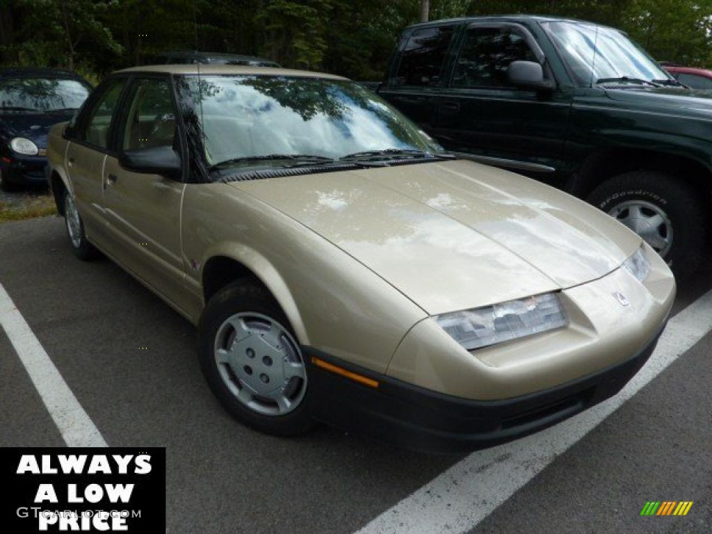 1995 S Series SL1 Sedan - Gold Metallic / Tan photo #1