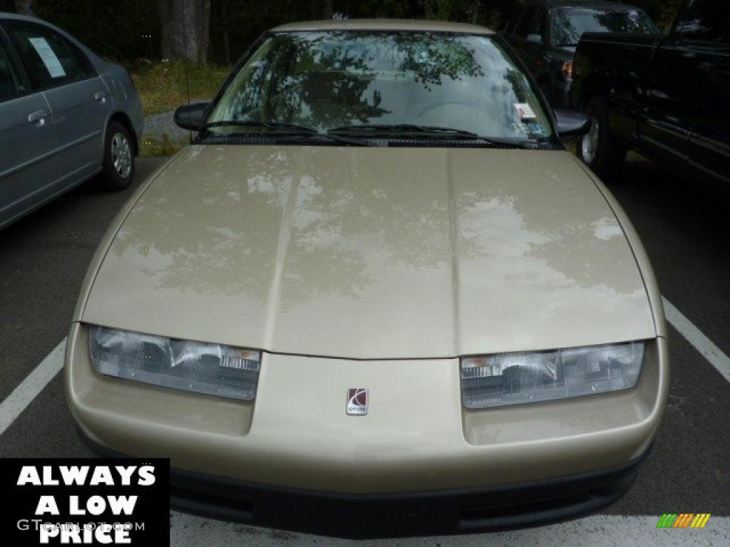 1995 S Series SL1 Sedan - Gold Metallic / Tan photo #2