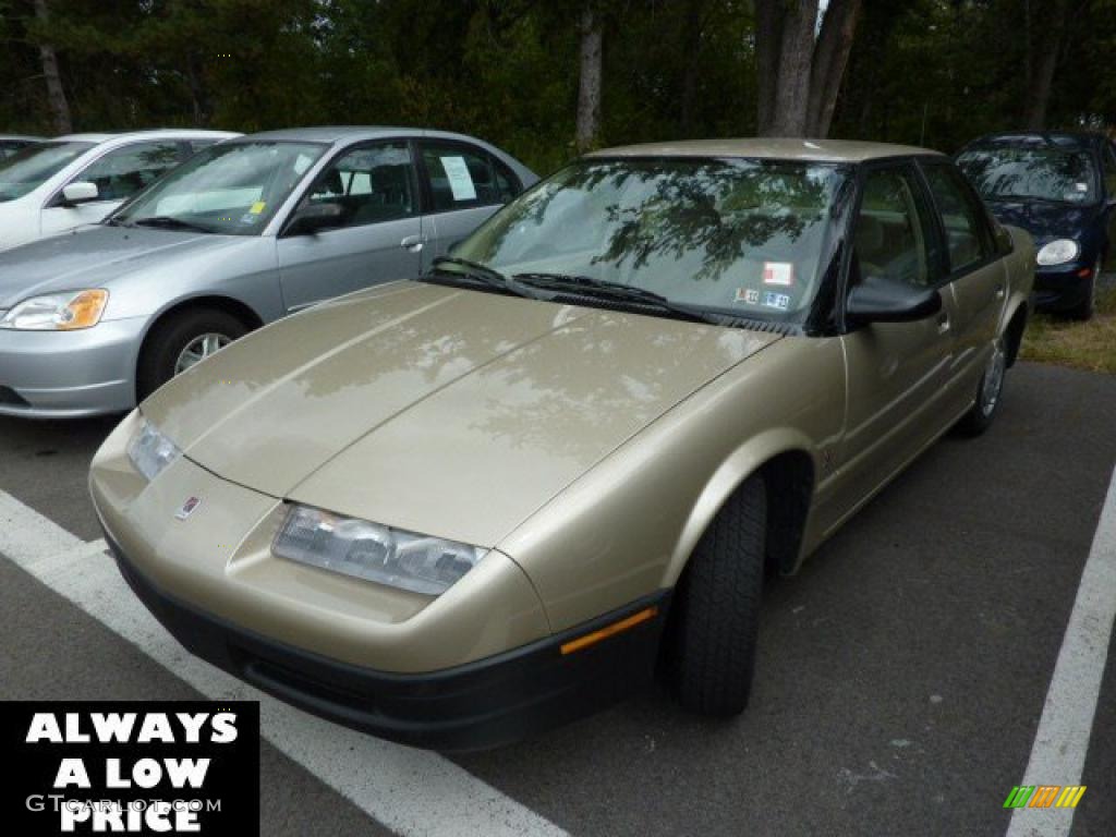 1995 S Series SL1 Sedan - Gold Metallic / Tan photo #3