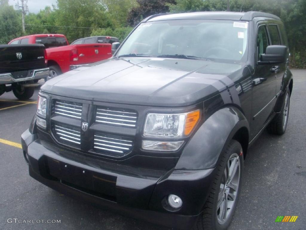 2011 Nitro Shock 4x4 - Brilliant Black Crystal Pearl / Dark Slate Gray photo #1