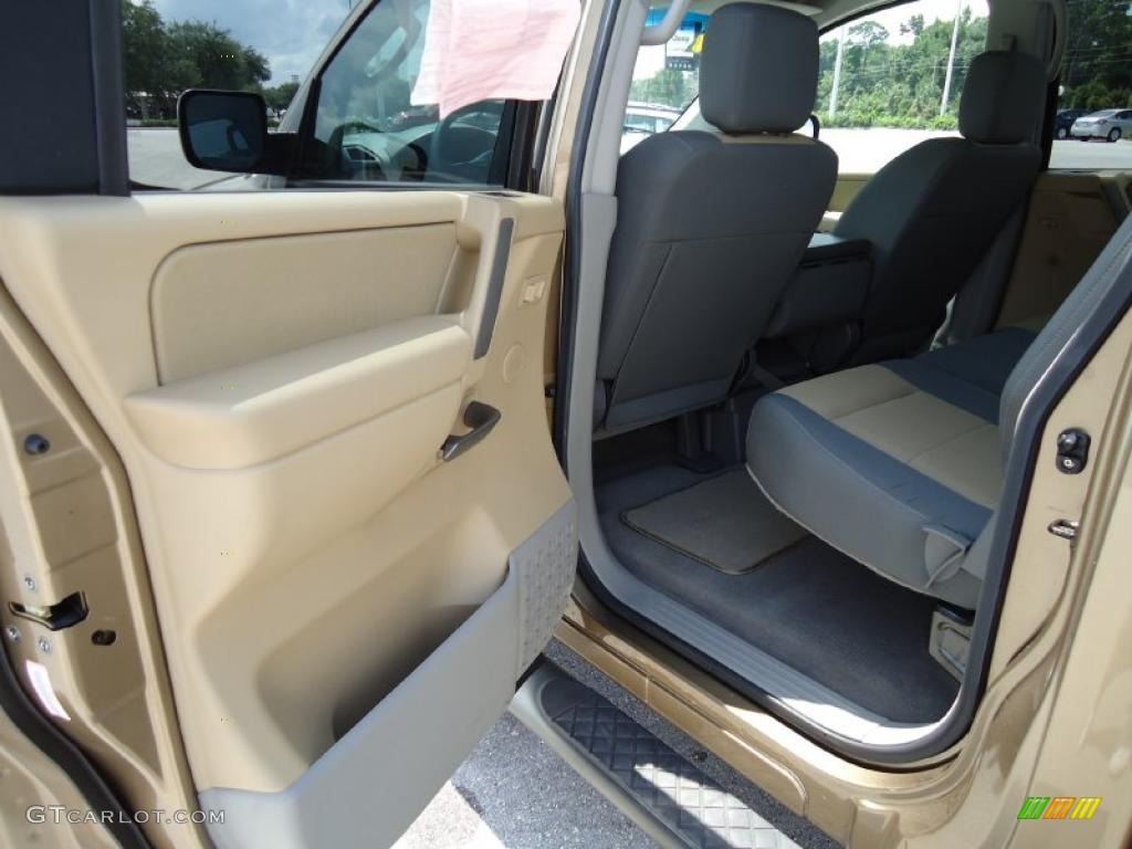 2004 Titan XE Crew Cab - Copper / Sand/Steel photo #7