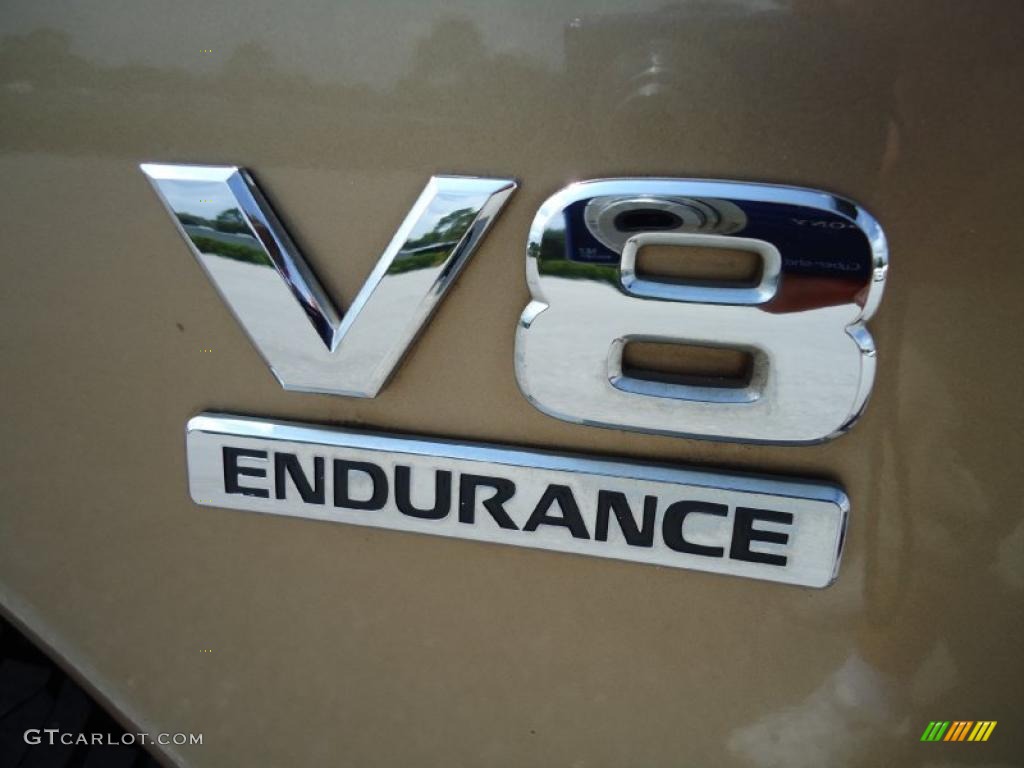 2004 Titan XE Crew Cab - Copper / Sand/Steel photo #10
