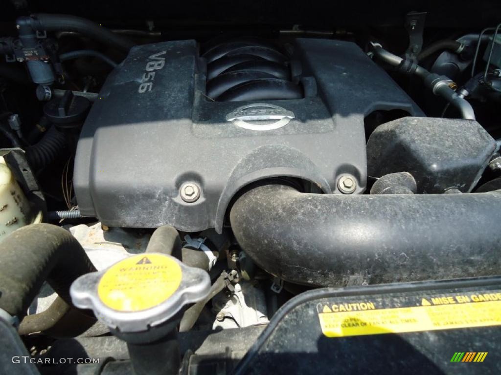 2004 Titan XE Crew Cab - Copper / Sand/Steel photo #29