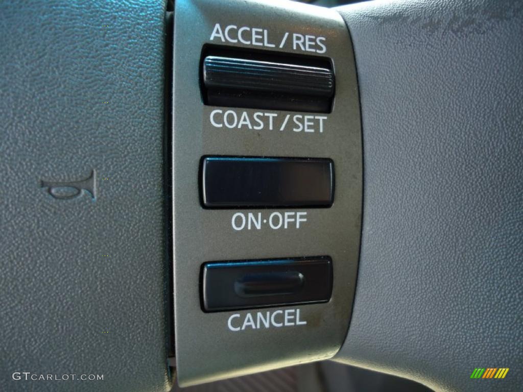 2004 Titan XE Crew Cab - Copper / Sand/Steel photo #35