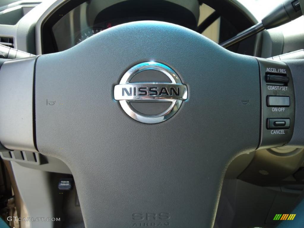 2004 Titan XE Crew Cab - Copper / Sand/Steel photo #36