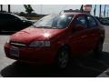 2006 Victory Red Chevrolet Aveo LS Sedan  photo #13