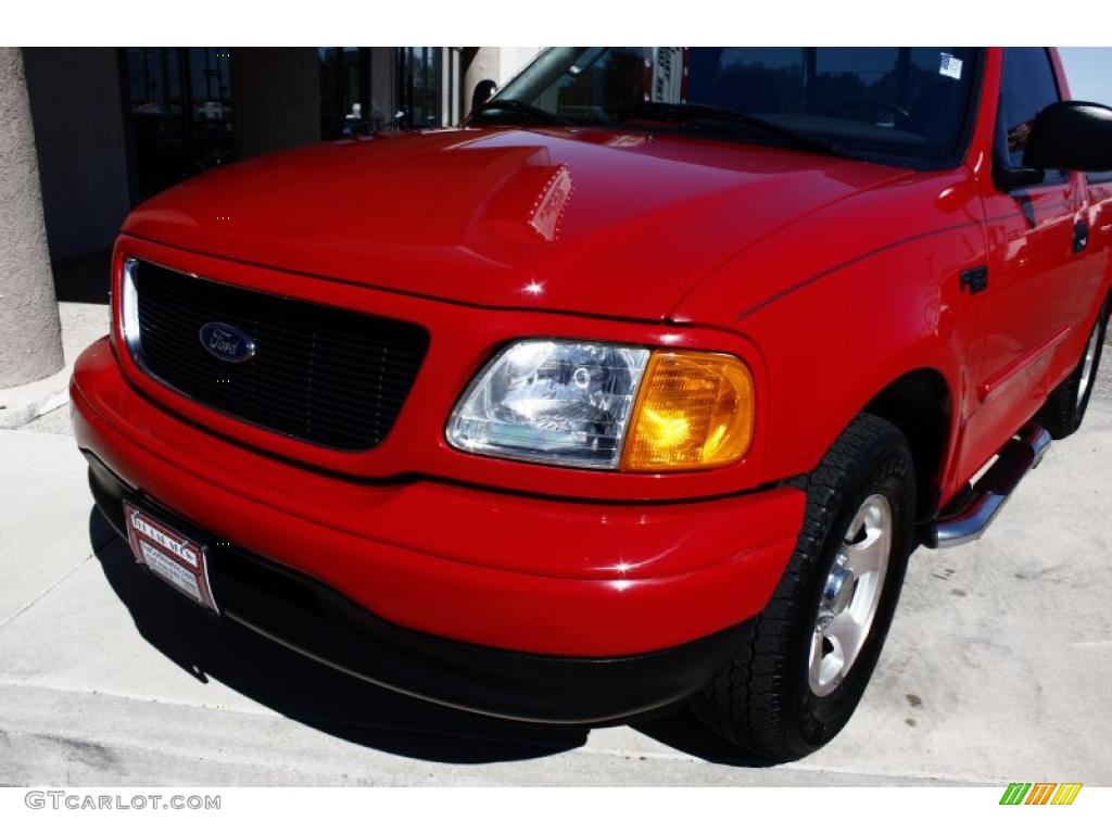 2004 F150 STX Heritage Regular Cab - Bright Red / Medium Graphite photo #13