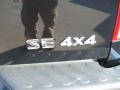 2009 Super Black Nissan Frontier SE Crew Cab 4x4  photo #31