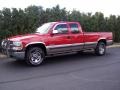 1999 Victory Red Chevrolet Silverado 1500 LS Extended Cab 4x4  photo #1