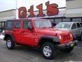 2009 Flame Red Jeep Wrangler Unlimited X 4x4 Right Hand Drive  photo #1