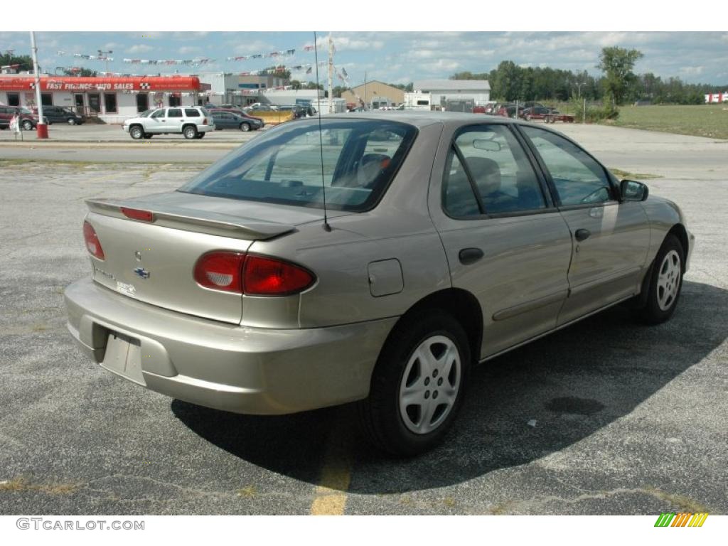 2002 Cavalier LS Sedan - Mayan Gold Metallic / Graphite photo #6