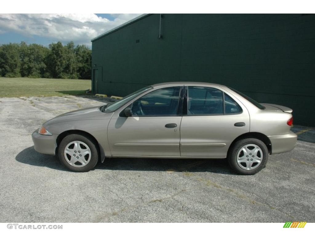 2002 Cavalier LS Sedan - Mayan Gold Metallic / Graphite photo #7