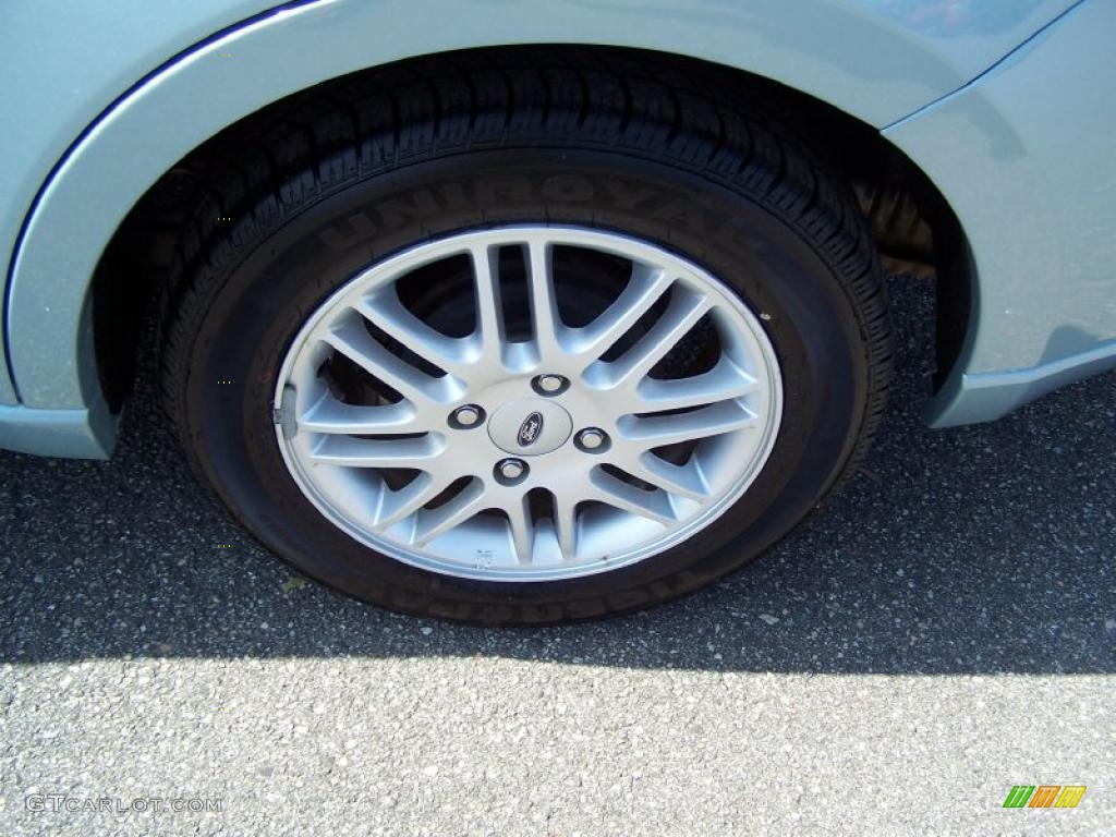 2009 Focus SE Sedan - Light Ice Blue Metallic / Medium Stone photo #9