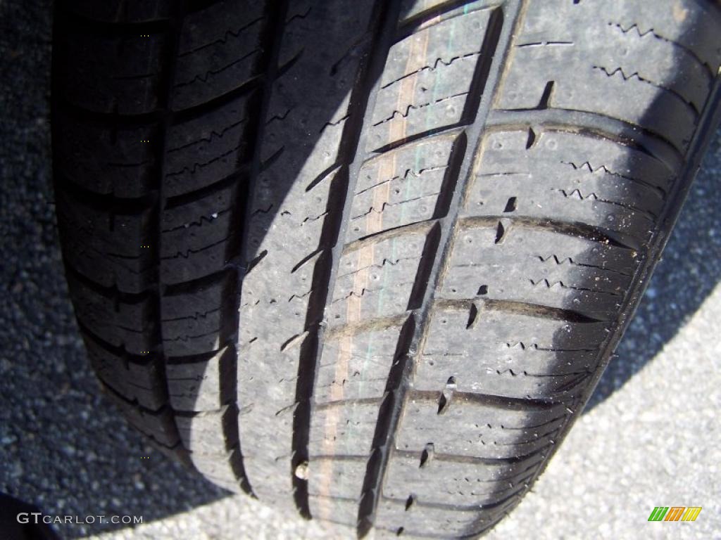 2009 Focus SE Sedan - Light Ice Blue Metallic / Medium Stone photo #10