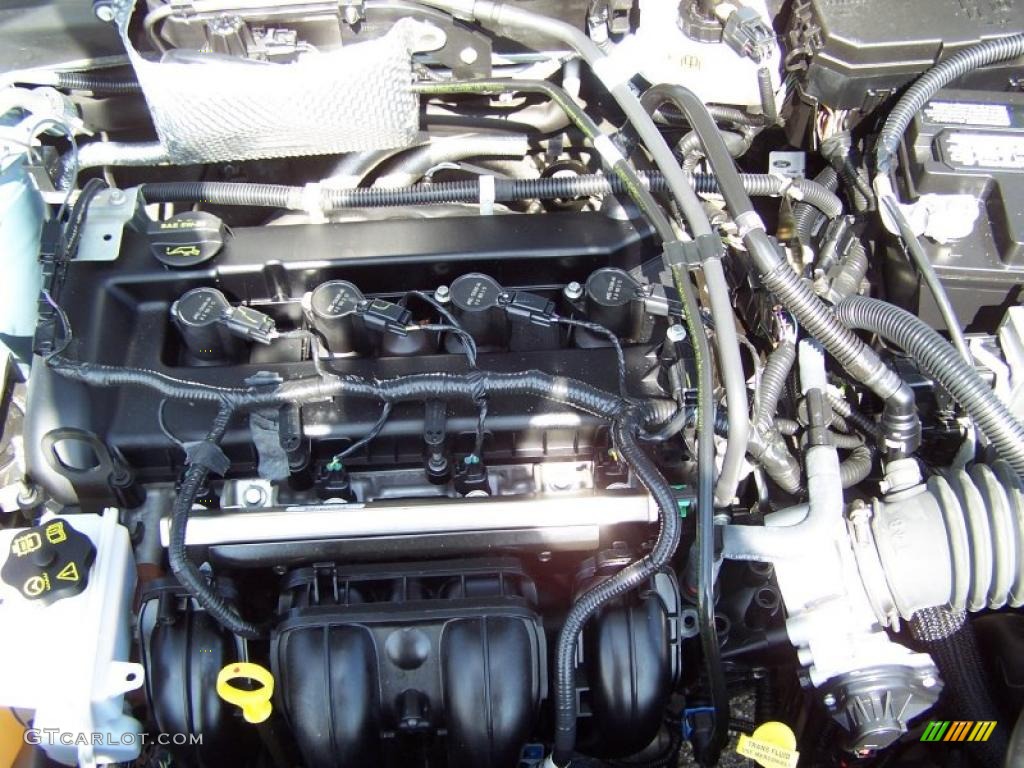 2009 Focus SE Sedan - Light Ice Blue Metallic / Medium Stone photo #11