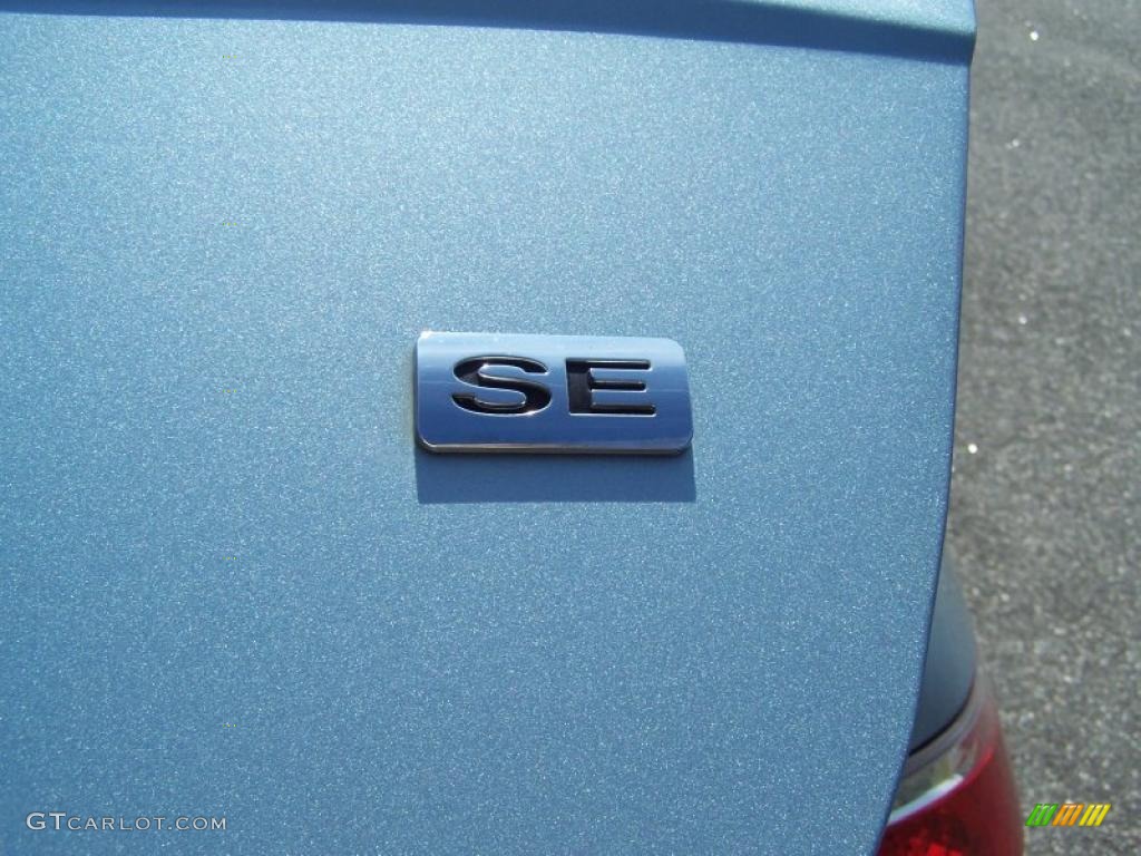 2009 Focus SE Sedan - Light Ice Blue Metallic / Medium Stone photo #12