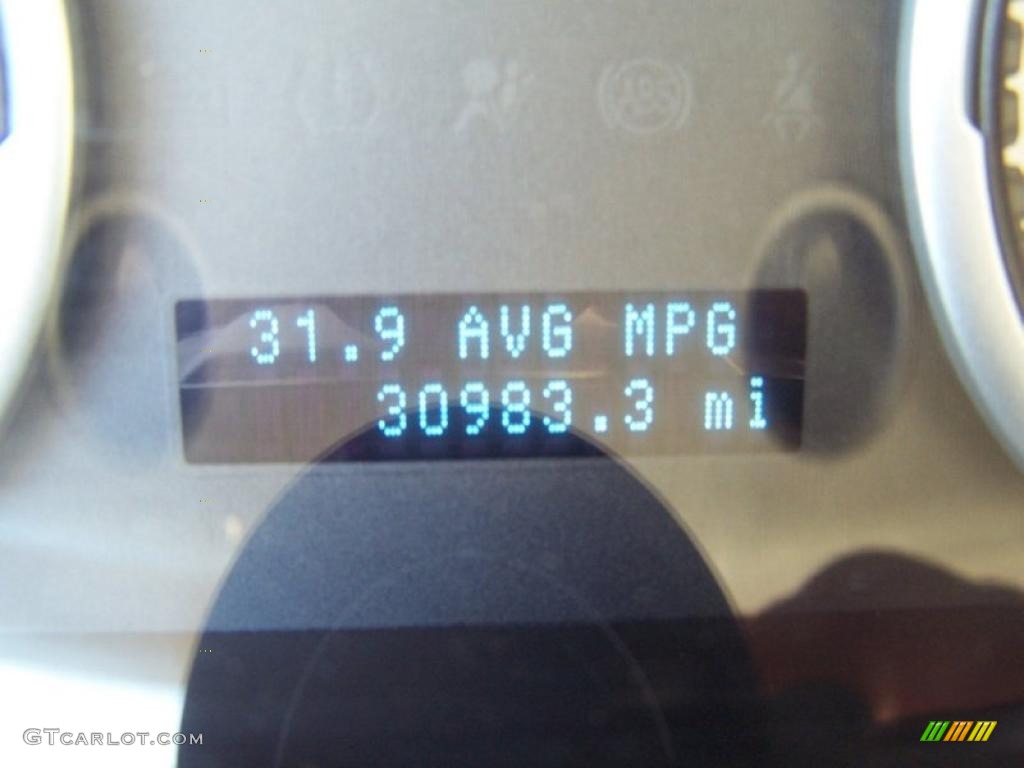 2009 Focus SE Sedan - Light Ice Blue Metallic / Medium Stone photo #25