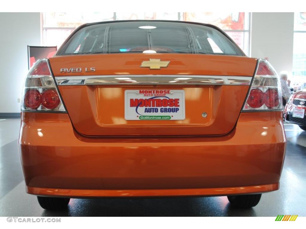 2008 Aveo LS Sedan - Spicy Orange Metallic / Charcoal photo #6