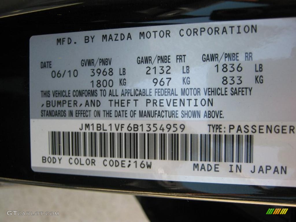 2011 MAZDA3 i Touring 4 Door - Black Mica / Black photo #24