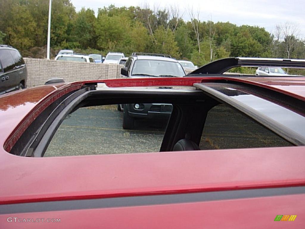2008 Mariner V6 Premier 4WD - Vivid Red Metallic / Black photo #18