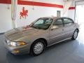 Gold Firemist 2000 Buick LeSabre Custom