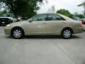 2004 Desert Sand Mica Toyota Camry LE  photo #8