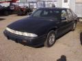 Black - Grand Prix SE Sedan Photo No. 1