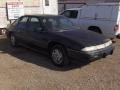 Black - Grand Prix SE Sedan Photo No. 2