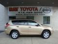 2010 Sandy Beach Metallic Toyota RAV4 I4 4WD  photo #1