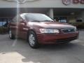 2001 Vintage Red Pearl Toyota Camry LE V6  photo #1