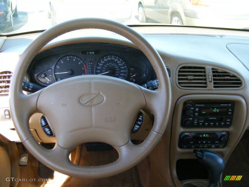 1999 Intrigue GLS - Gold Metallic / Neutral photo #15