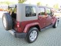 2009 Red Rock Crystal Pearl Jeep Wrangler Unlimited Sahara  photo #5