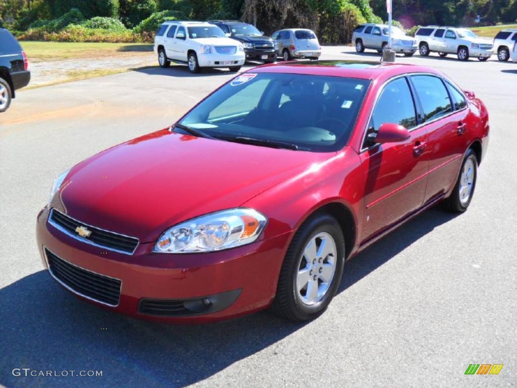 2006 Impala LTZ - Sport Red Metallic / Ebony Black photo #1