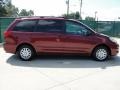 2010 Salsa Red Pearl Toyota Sienna LE  photo #2