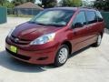 2010 Salsa Red Pearl Toyota Sienna LE  photo #7